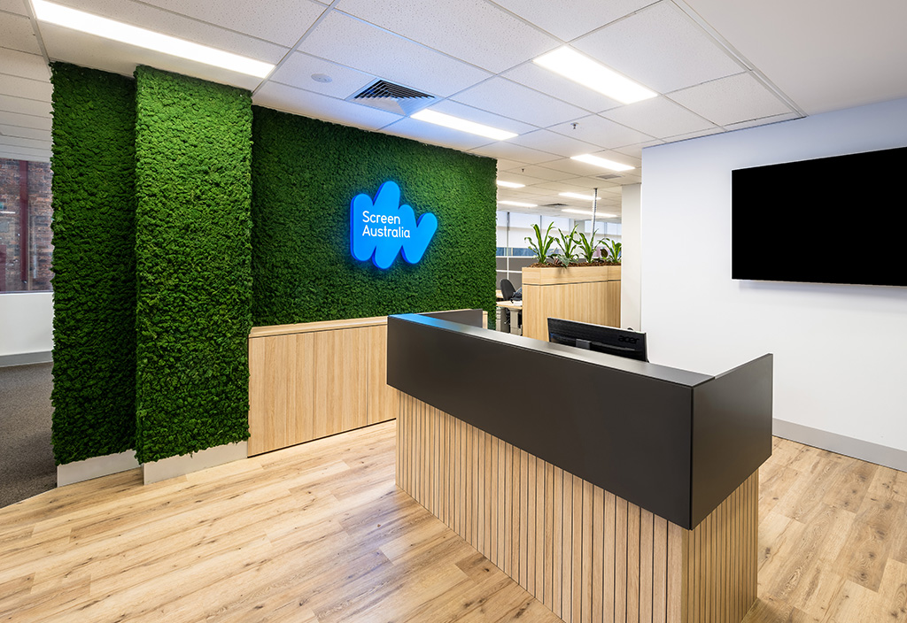 Screen Australia reception with featured moss wall and custom reception desk